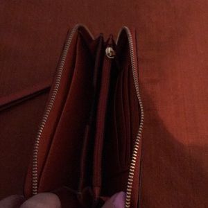 Michael Kors Bags - Michael Kors Orange wristlet wallet Michael Kors Bags - Michael Kors Orange wristlet wallet